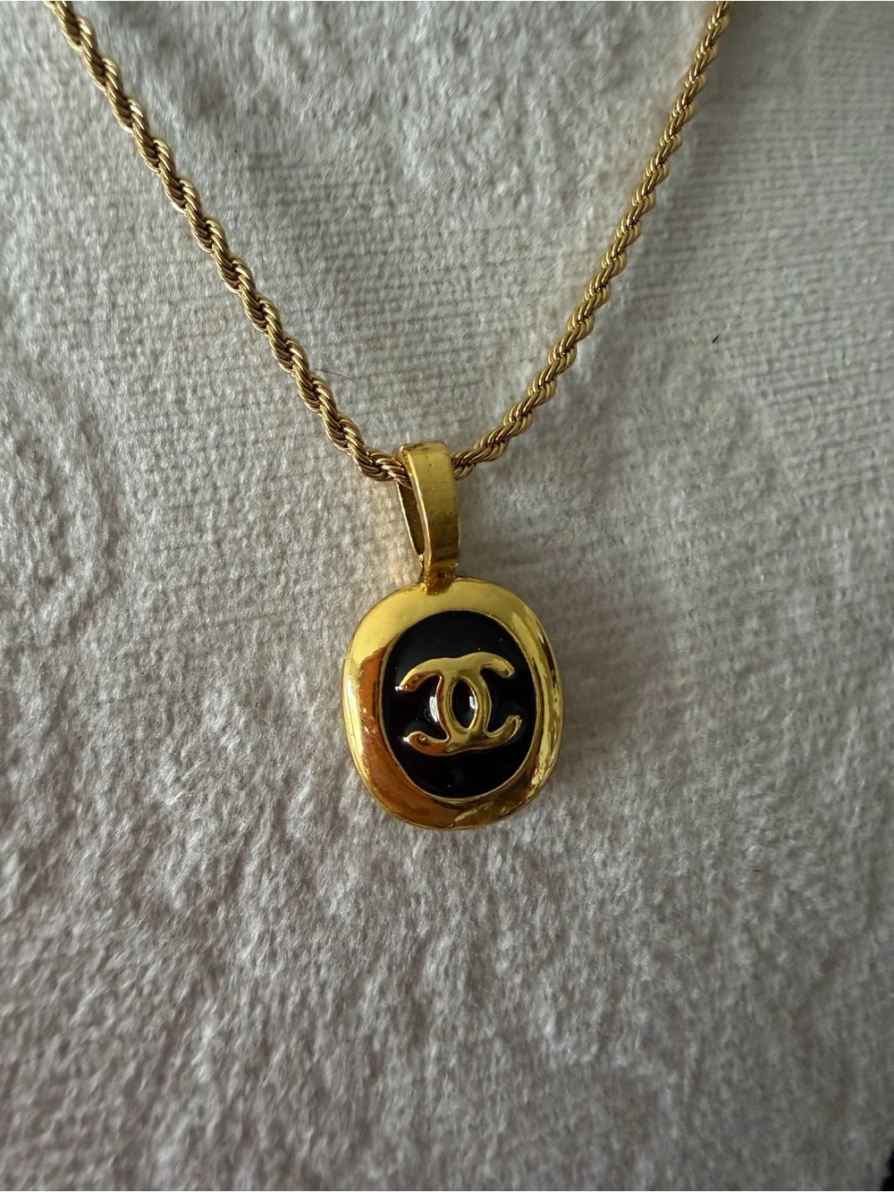 CHANEL Gold and Black Oval CC Pendant Necklace on Rope Chain